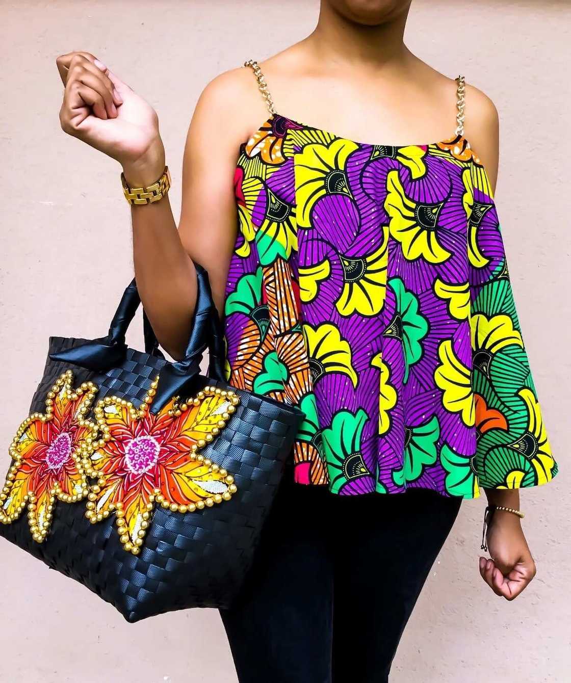 ankara tops for ladies
stylish tops to wear with jeans
ankara blouse on jeans
trendy styles made with ankara
peplum ankara tops
ankara tops designs