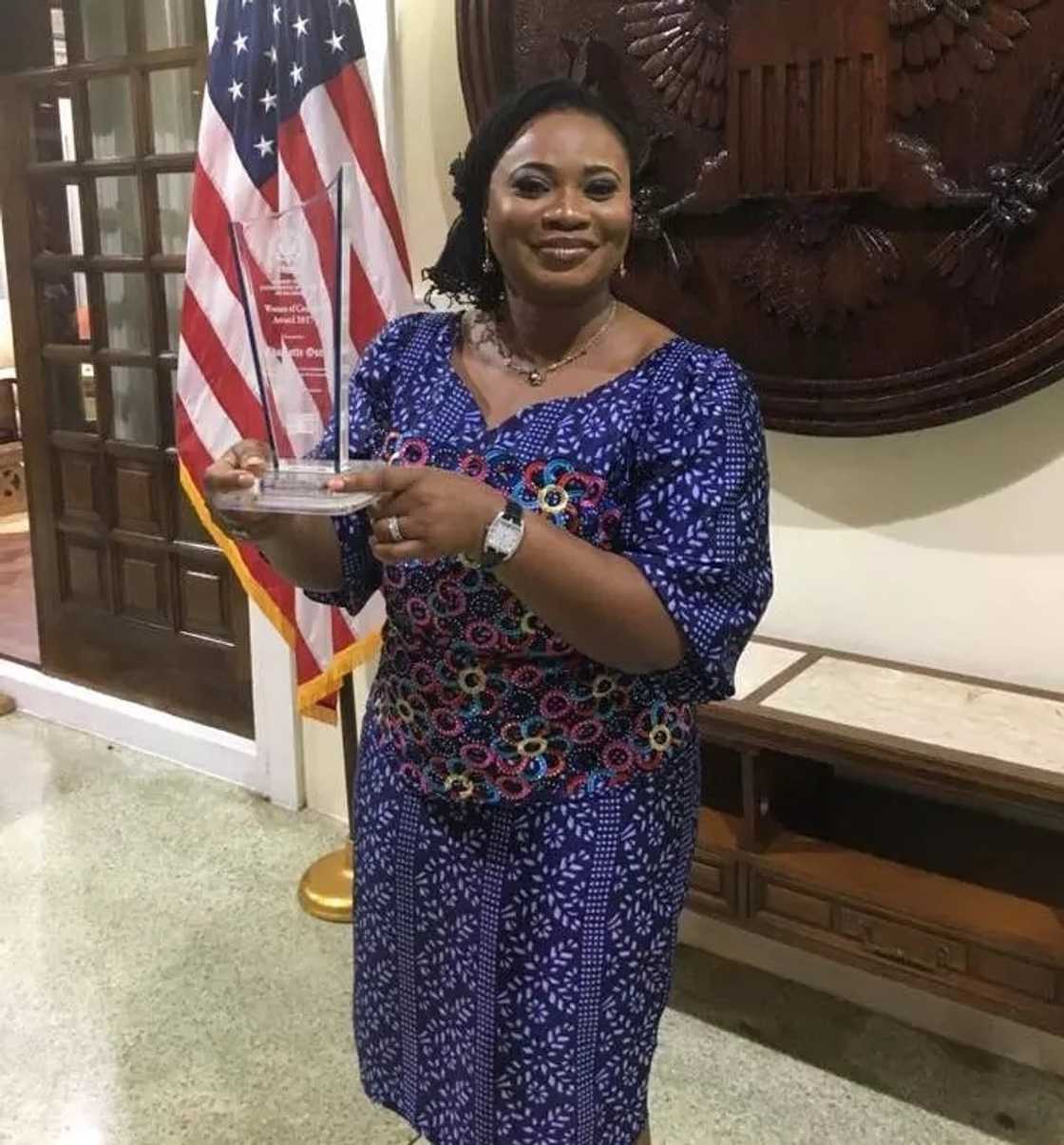 Charlotte Osei with her "Women of Courage" award