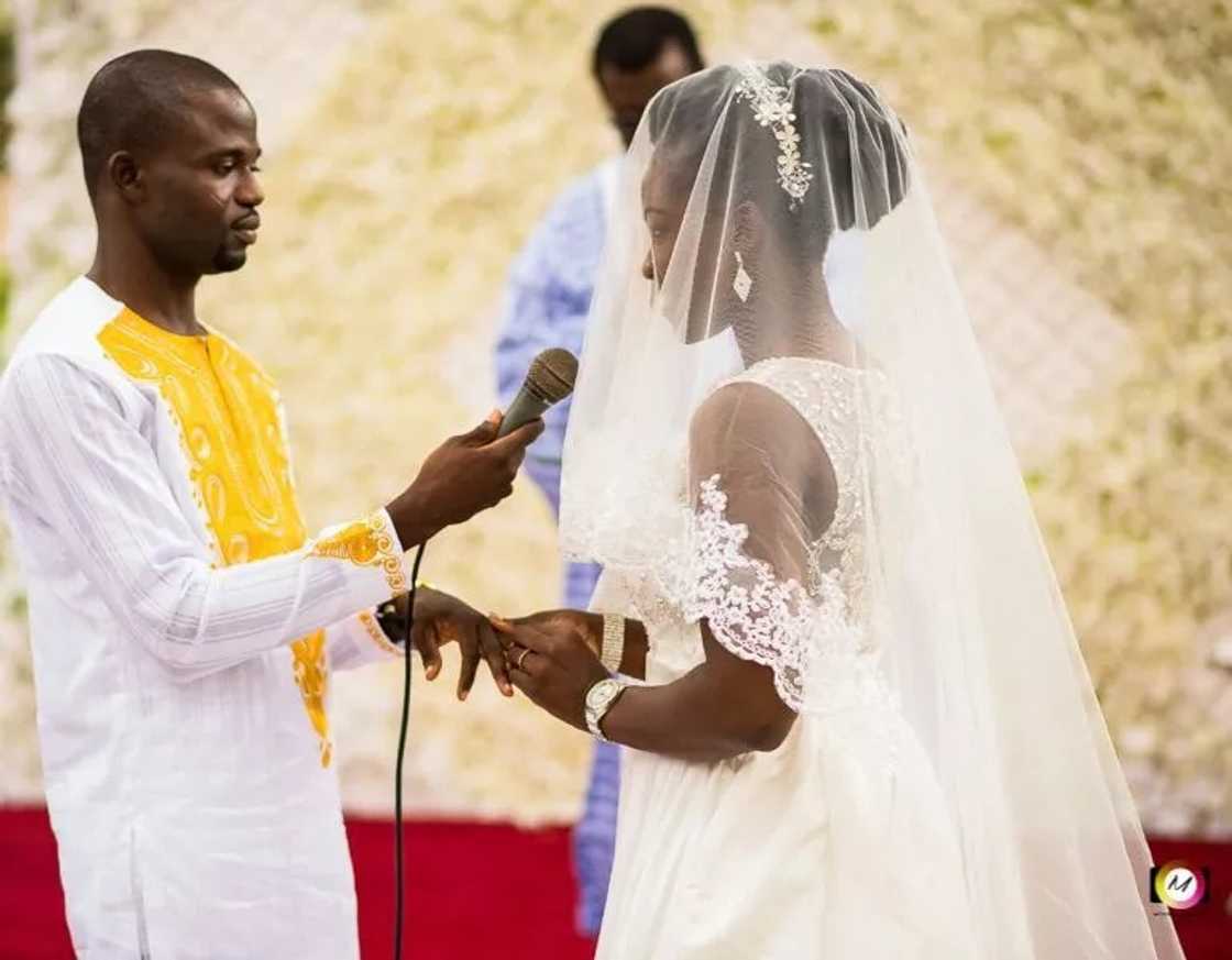 Wedding photos of Manasseh Azure Awuni and Becky