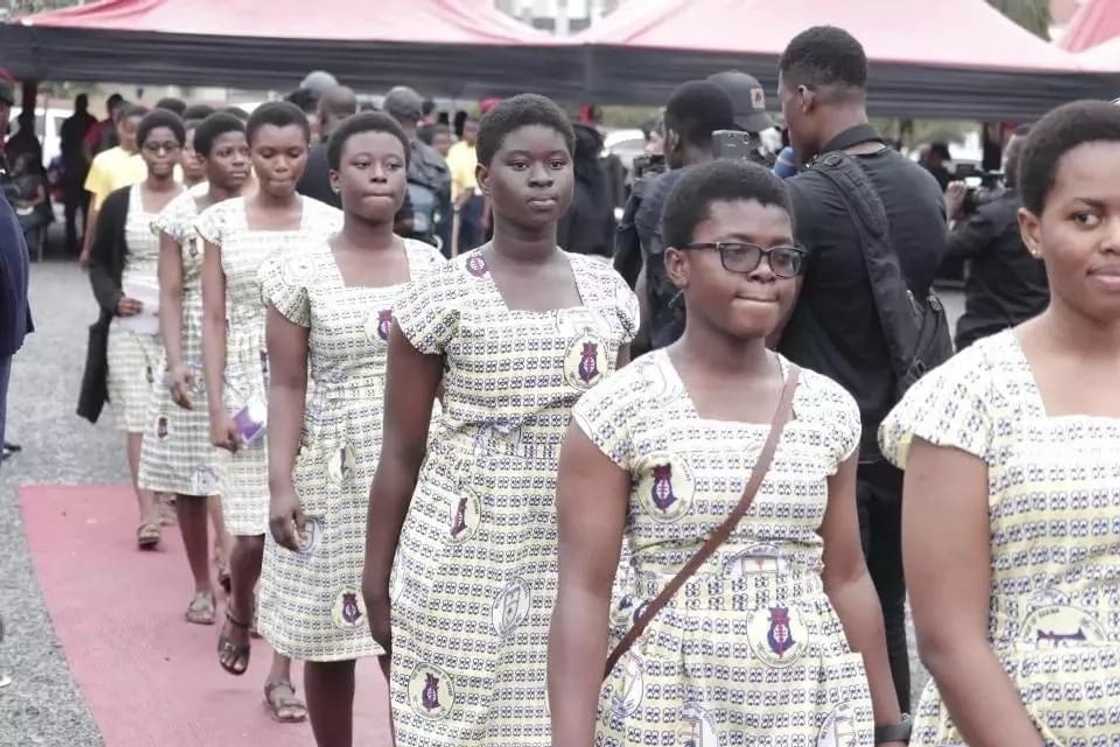 Some of the students from Ebony's former school, Meghis, filing past to pay their last respect