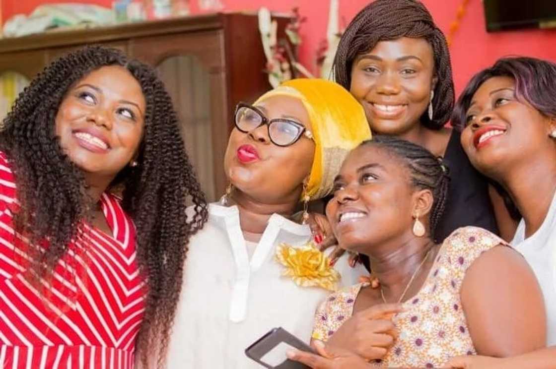 Gifty Anti takes a selfie with friends Gifty Anti takes a selfie with friends