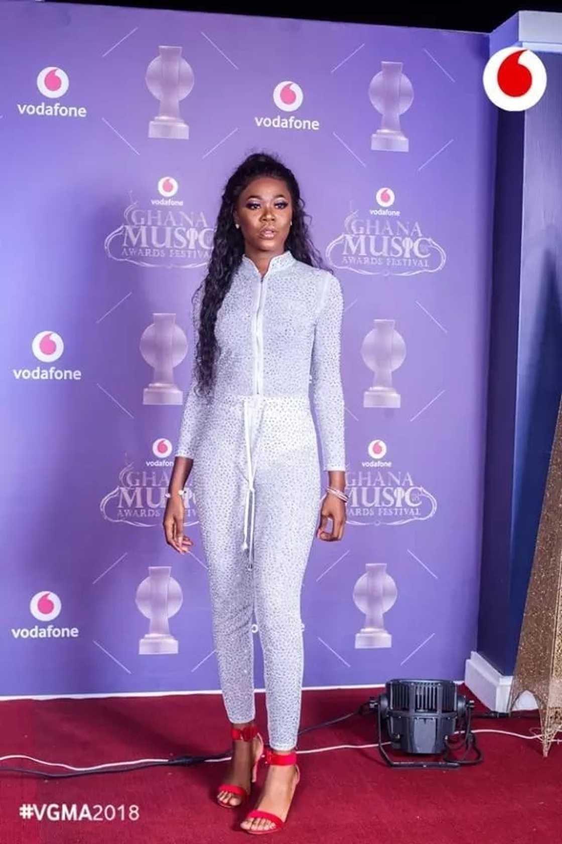 A lady wearing a white dress A lady wearing a white dress