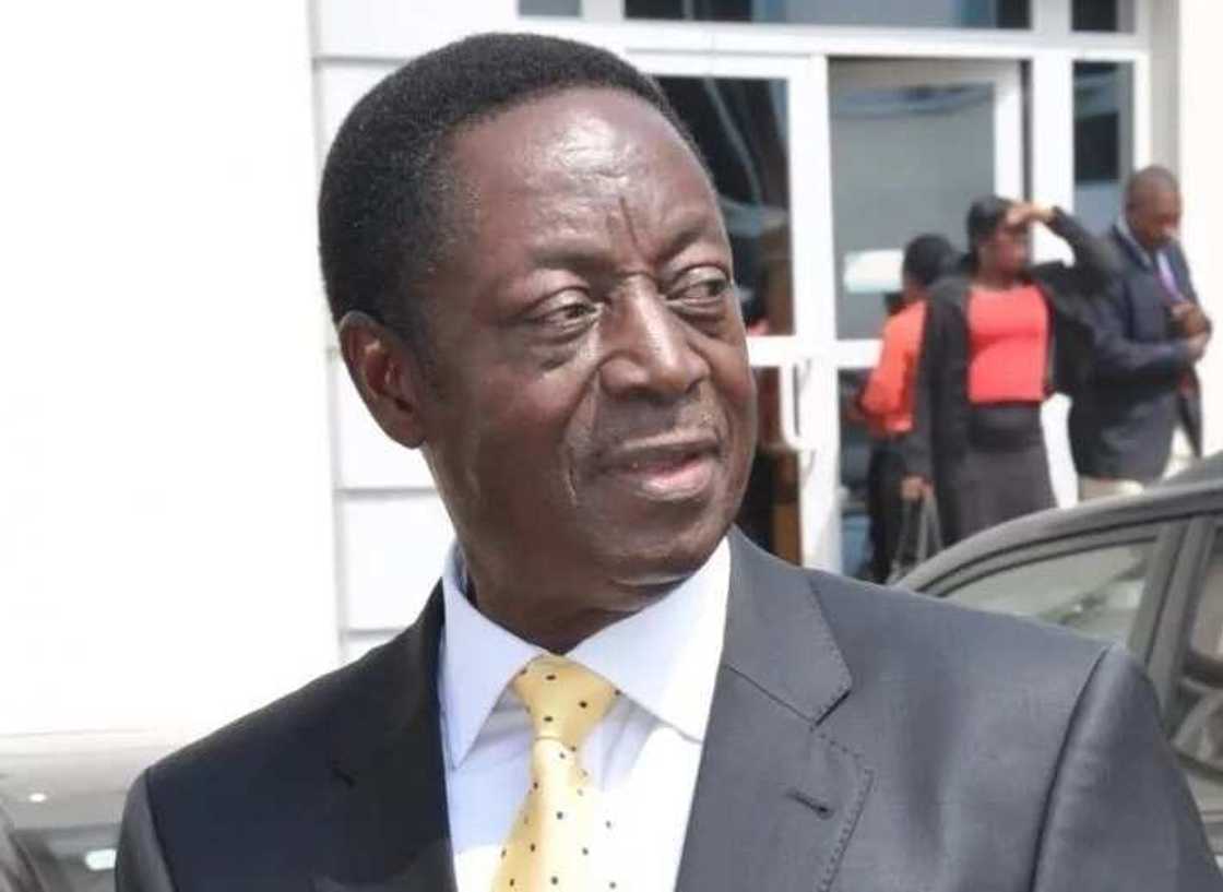 Dr. Kwabena Duffuor looking behind him Dr. Kwabena Duffuor looking behind him