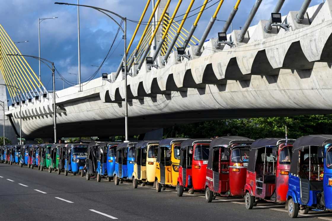Motorists queue to buy petrol in Colombo. Sri Lanka's population suffered desperate shortages of essentials like fuel in 2022 Motorists queue to buy petrol in Colombo. Sri Lanka's population suffered desperate shortages of essentials like fuel in 2022