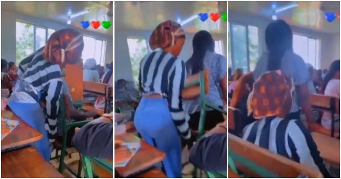 Photo of two students struggling over chair Photo of two students struggling over chair