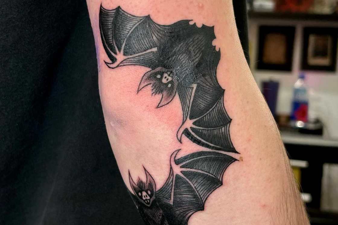 Bats encircling the elbow tattoo Bats encircling the elbow tattoo