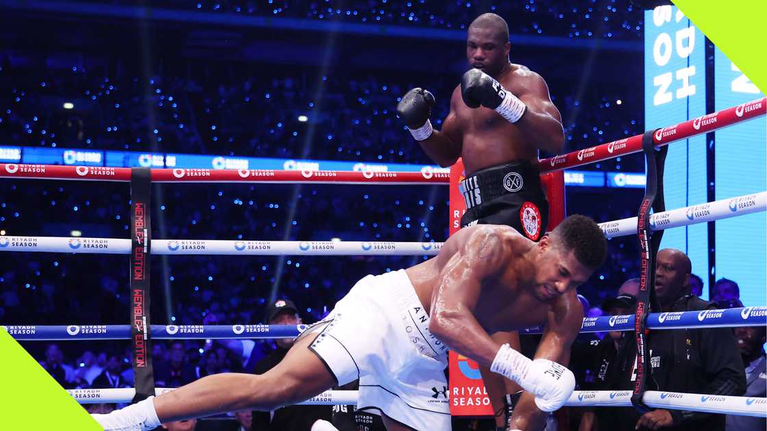 Anthony Joshua is knocked down by Dubois