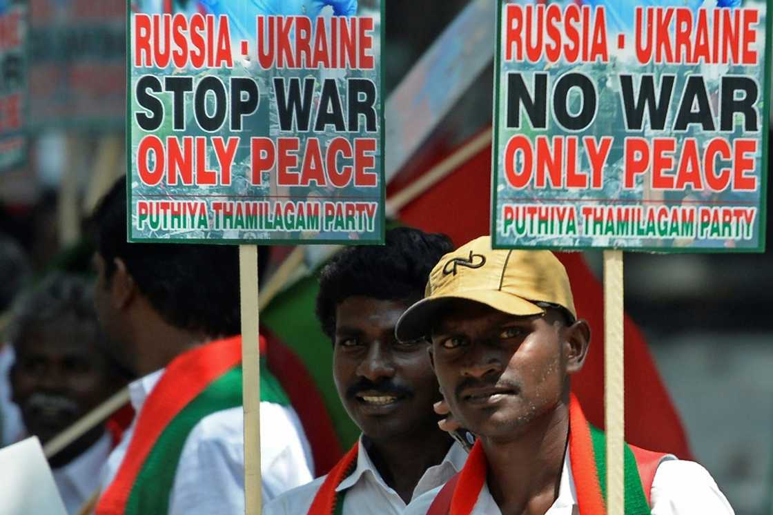 Members of the Puthiya Tamilagam party hold placards for a peaceful end to Russia's invasion of Ukraine at a March 2022 demonstration in Chennai Members of the Puthiya Tamilagam party hold placards for a peaceful end to Russia's invasion of Ukraine at a March 2022 demonstration in Chennai
