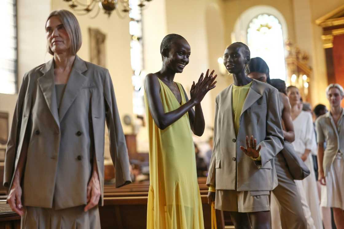 Models prepare to present South Korean designer Eudon Choi's Spring/Summer 2024 collection on Saturday Models prepare to present South Korean designer Eudon Choi's Spring/Summer 2024 collection on Saturday