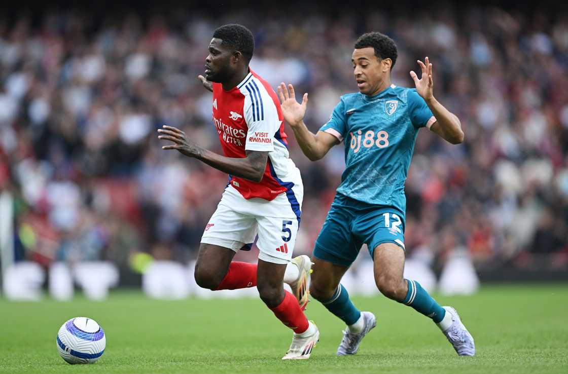 Ghana's Thomas Partey of Arsenal runs with the ball whilst under pressure from Tyler Adams of AFC Bournemouth during the Premier League match between Arsenal FC and AFC Bournemouth at Emirates Stadium on May 03, 2025 in London, England Ghana's Thomas Partey of Arsenal runs with the ball whilst under pressure from Tyler Adams of AFC Bournemouth during the Premier League match between Arsenal FC and AFC Bournemouth at Emirates Stadium on May 03, 2025 in London, England