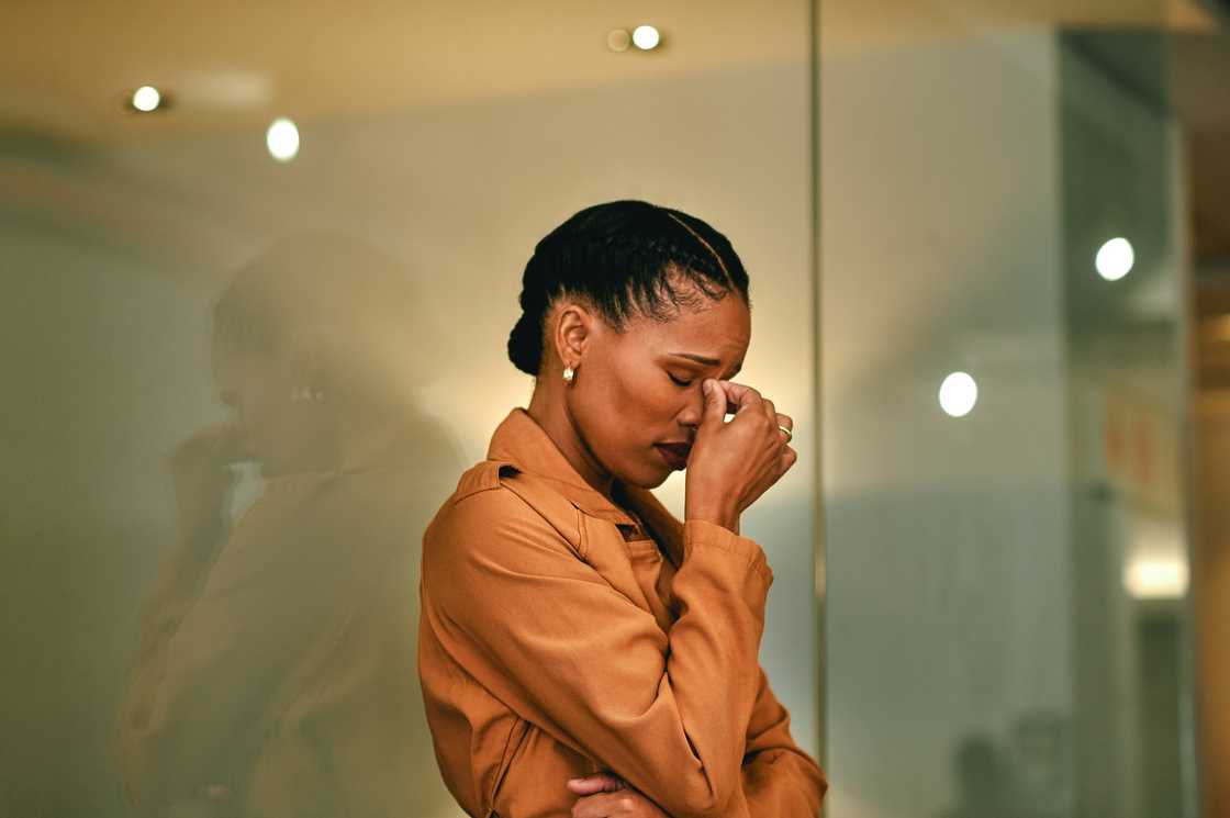 A sad woman in an office A sad woman in an office