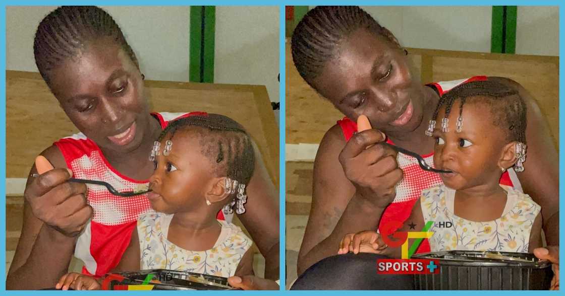 Gambian athletes feeds daughter after playing in All African Games