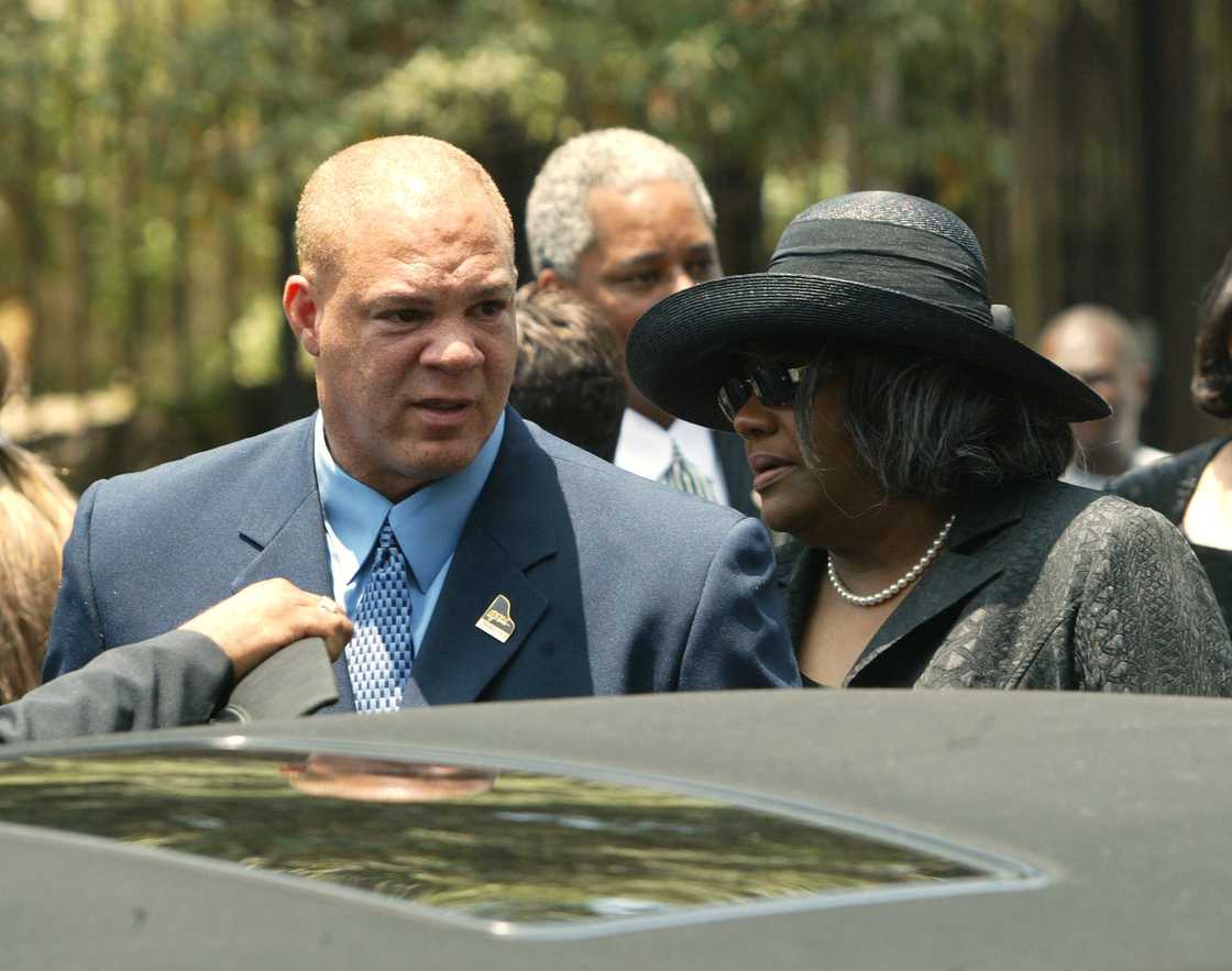 Rev. Robert Robinson, Sr. and Evelyn, son and daughter of the late Ray Charles, attend the funeral of recording artist Ray Charles at the First A.M.E. in California. Photo: Frederick M. Brown Rev. Robert Robinson, Sr. and Evelyn, son and daughter of the late Ray Charles, attend the funeral of recording artist Ray Charles at the First A.M.E. in California. Photo: Frederick M. Brown