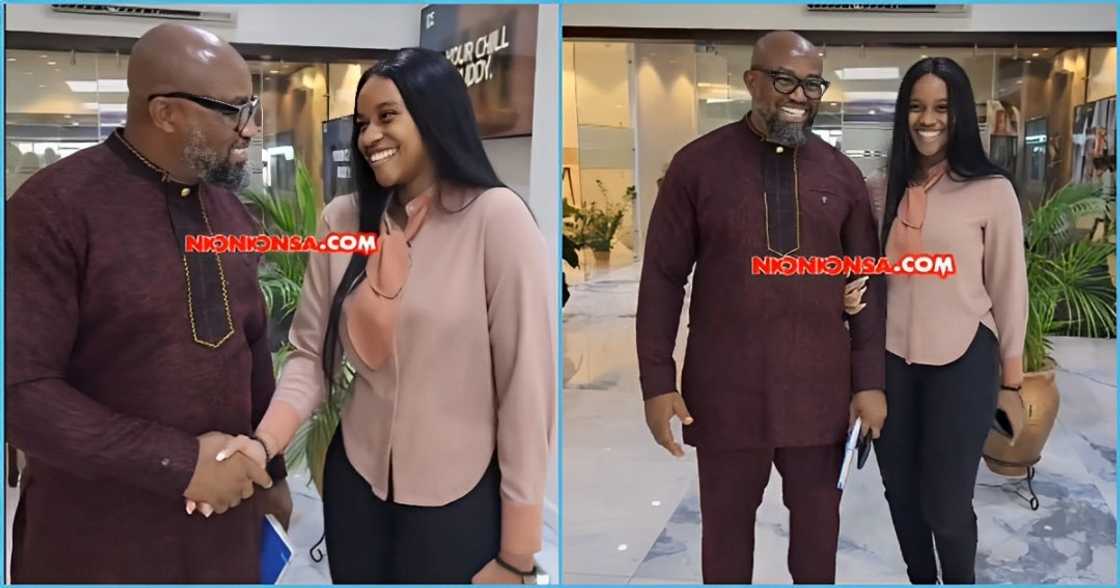 McDan exchanges special handshake with pretty daughter as they chitchat McDan exchanges special handshake with pretty daughter as they chitchat