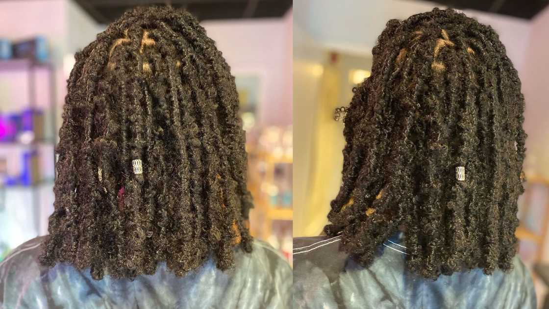 A woman showcasing her Black distressed locs A woman showcasing her Black distressed locs