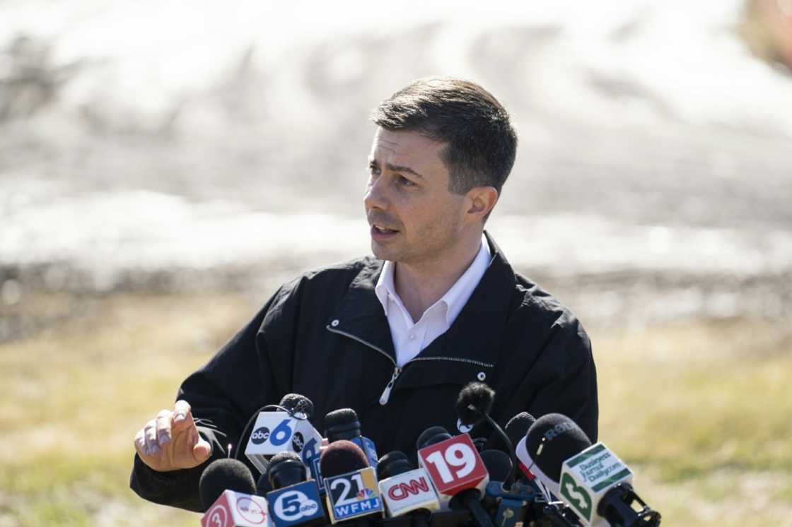 US Transportation Secretary Pete Buttigieg, seen here near the site of a toxic train derailment in East Palestine, Ohio, called on rail companies not to wait for Congress to legislate before introducing safety reforms US Transportation Secretary Pete Buttigieg, seen here near the site of a toxic train derailment in East Palestine, Ohio, called on rail companies not to wait for Congress to legislate before introducing safety reforms