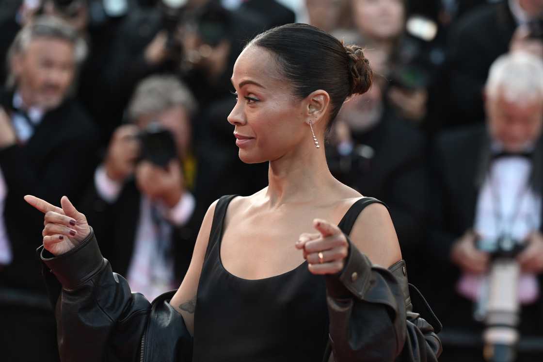 Saldaña walks the red carpet at the 78th Cannes International Film Festival. Saldaña walks the red carpet at the 78th Cannes International Film Festival.