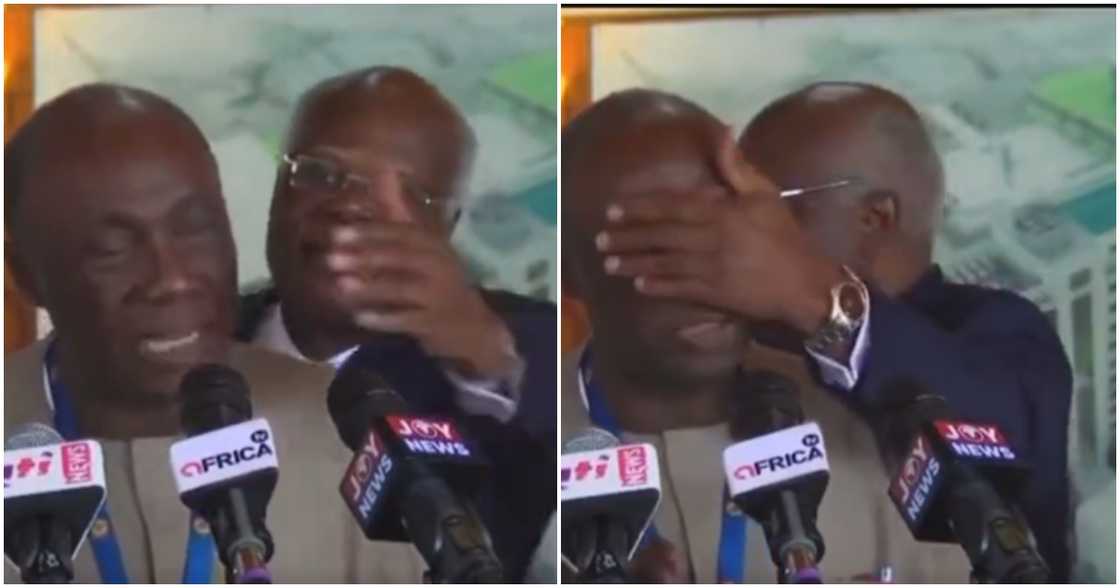 KT Hammond covered the eyes of Kwabena Donkor during a live press conference.