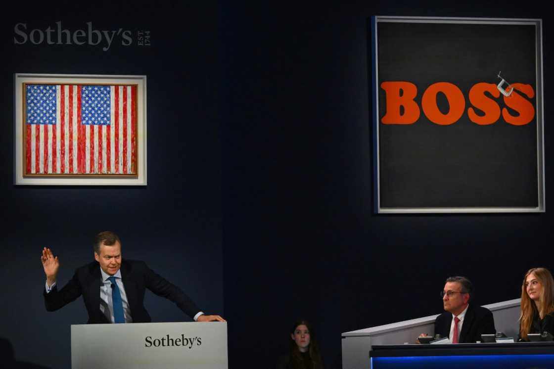 'Flags' by the 93-year-old Jasper Johns sold for $41 million at auction, while 'Securing the Last Letter (Boss)' by painter and photographer Ed Ruscha sold for $39.4 million 'Flags' by the 93-year-old Jasper Johns sold for $41 million at auction, while 'Securing the Last Letter (Boss)' by painter and photographer Ed Ruscha sold for $39.4 million
