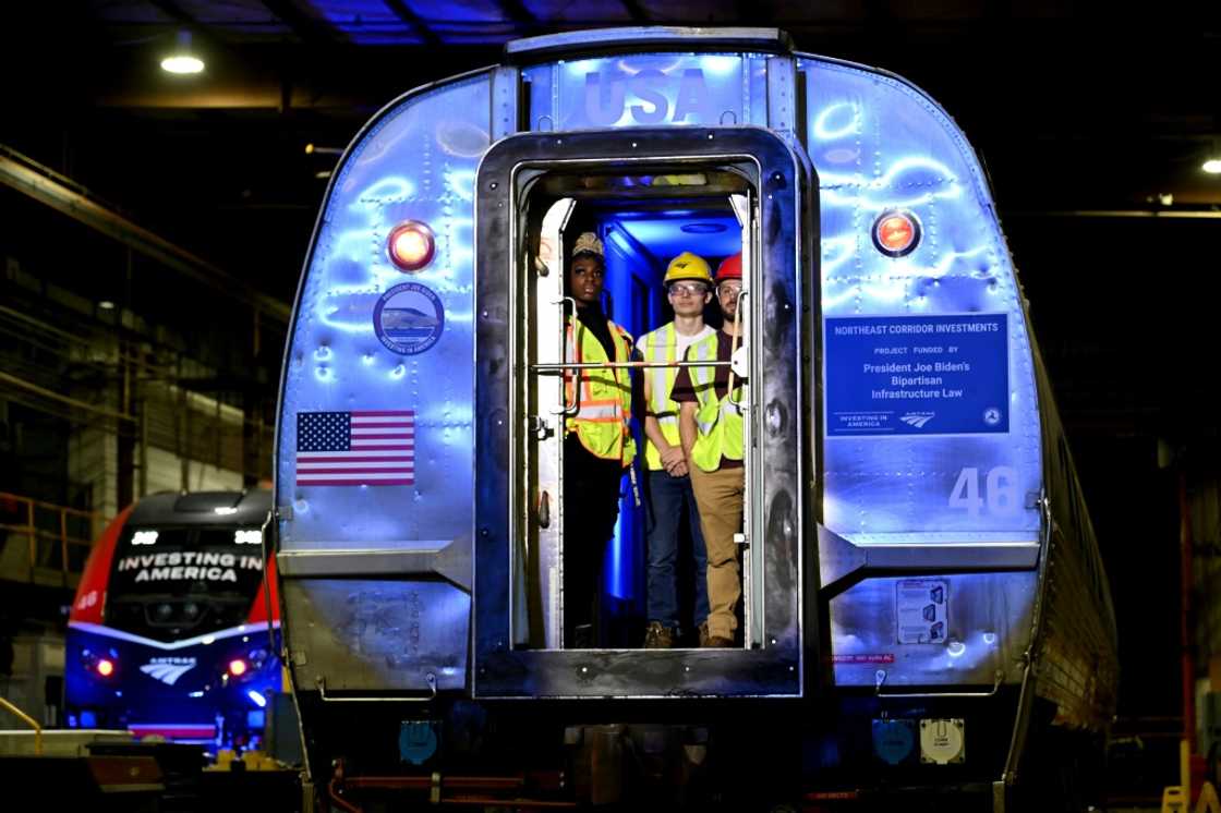 Workers are seen at an Amtrak facility in New Castle County, Delaware in November 2023 Workers are seen at an Amtrak facility in New Castle County, Delaware in November 2023