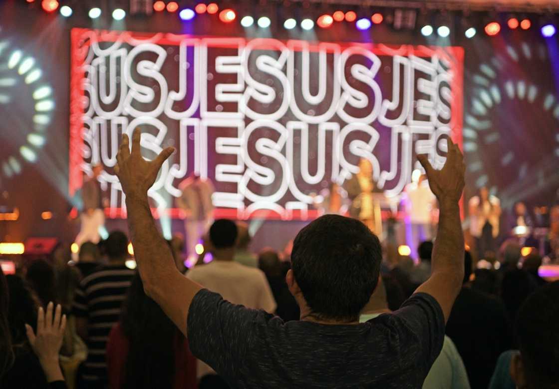 Churchgoers attend a ceremony at the Assembly of God evangelical church in Rio de Janeiro, Brazil Churchgoers attend a ceremony at the Assembly of God evangelical church in Rio de Janeiro, Brazil