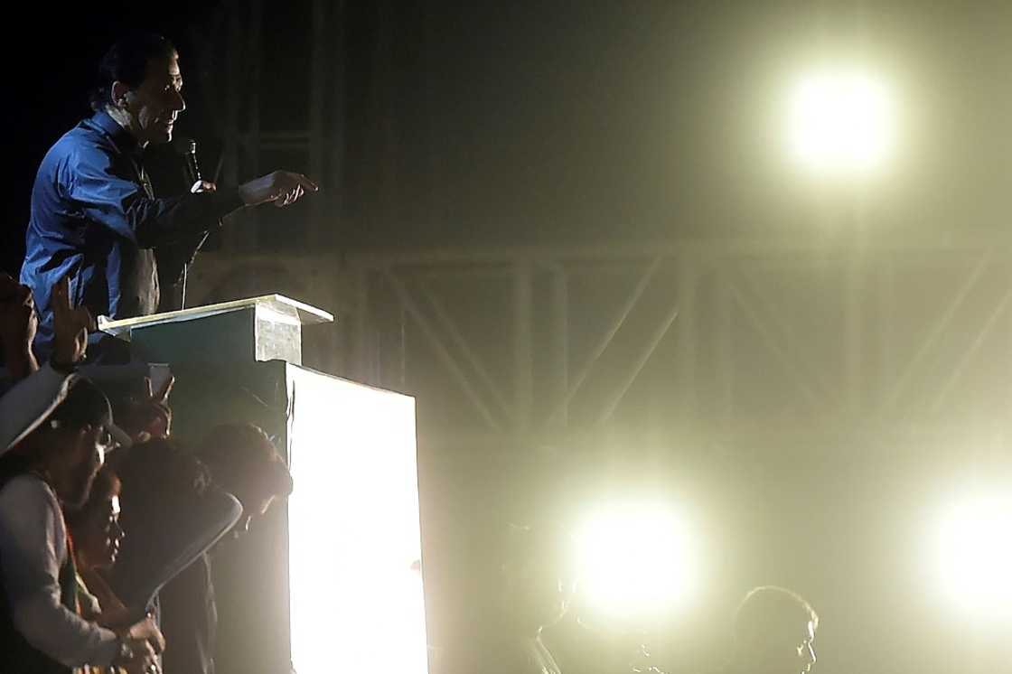 Former Pakistan prime minister Imran Khan ddresses supporters during a rally in Karachi ahead of Sunday's by-election Former Pakistan prime minister Imran Khan ddresses supporters during a rally in Karachi ahead of Sunday's by-election