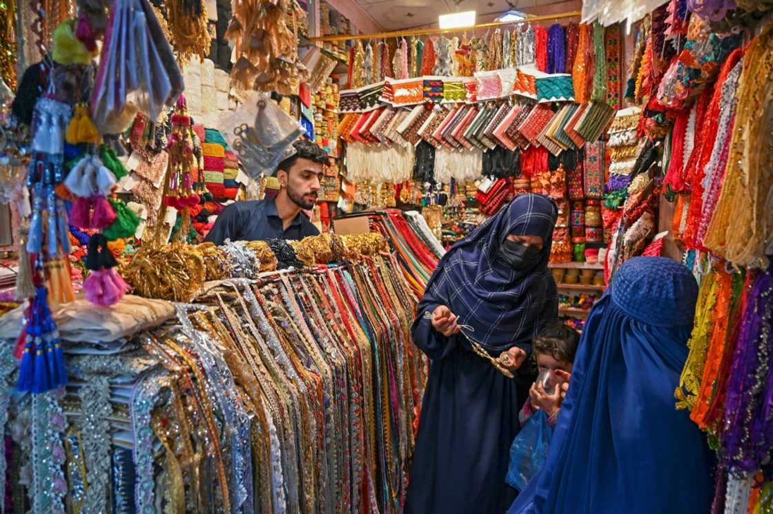 Women shop for jewellery at a market in Peshawar on June 8, a day before Pakistan releases its budget Women shop for jewellery at a market in Peshawar on June 8, a day before Pakistan releases its budget
