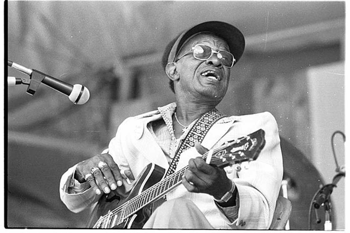 Lightnin Hopkins performing on stage Lightnin Hopkins performing on stage