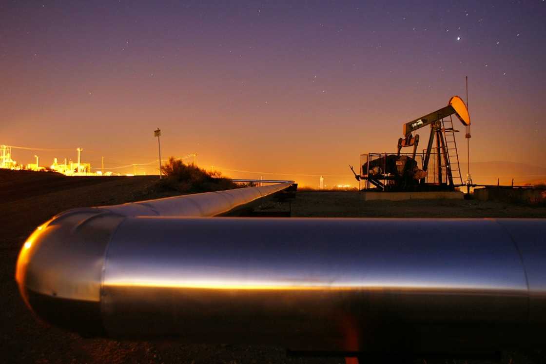 Oil prices sank after key producers said they would ramp up output more than expected next month Oil prices sank after key producers said they would ramp up output more than expected next month