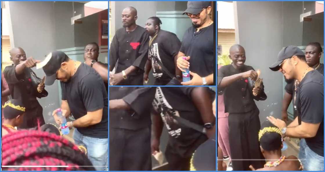 Lil Win brought traditional dancers to put on a display for Ramsey Nouah and showered him with money Lil Win brought traditional dancers to put on a display for Ramsey Nouah and showered him with money