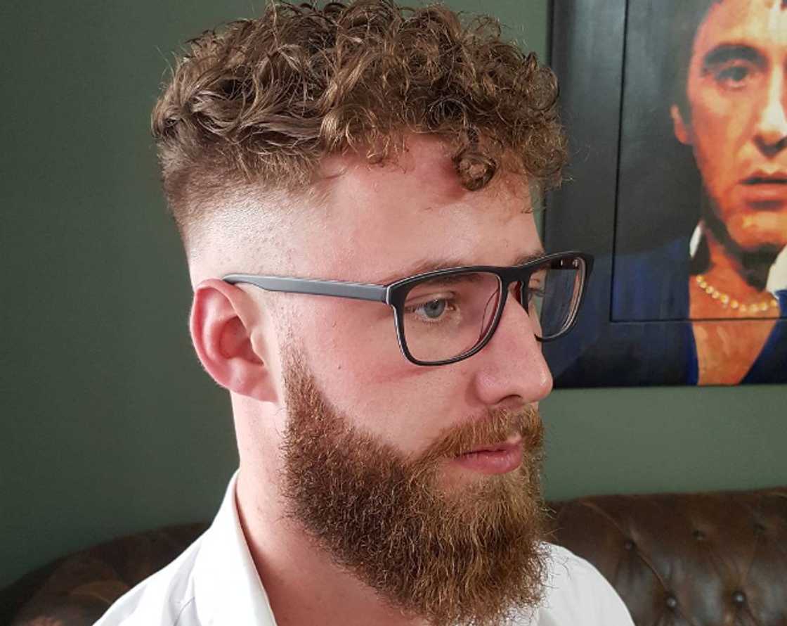 Red curls with shaved sides Red curls with shaved sides