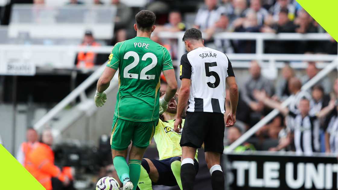 Fabian Schar and Nick Pope stand over Brereton Diaz after the Swiss defender headbutted the Chilean. Fabian Schar and Nick Pope stand over Brereton Diaz after the Swiss defender headbutted the Chilean.