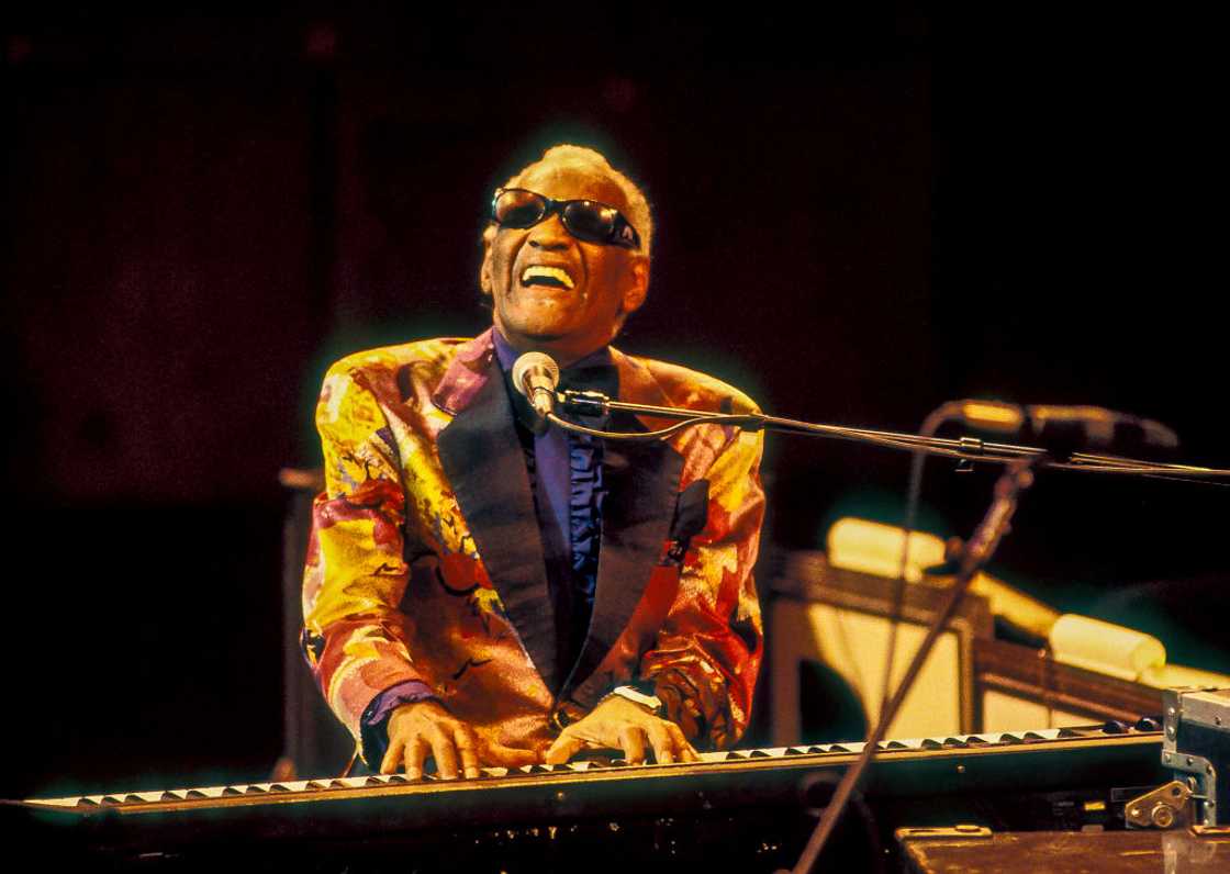 Ray Charles plays piano as he performs during a JVC Jazz Festival concert at Avery Fisher Hall at Lincoln Center, New York, New York Ray Charles plays piano as he performs during a JVC Jazz Festival concert at Avery Fisher Hall at Lincoln Center, New York, New York