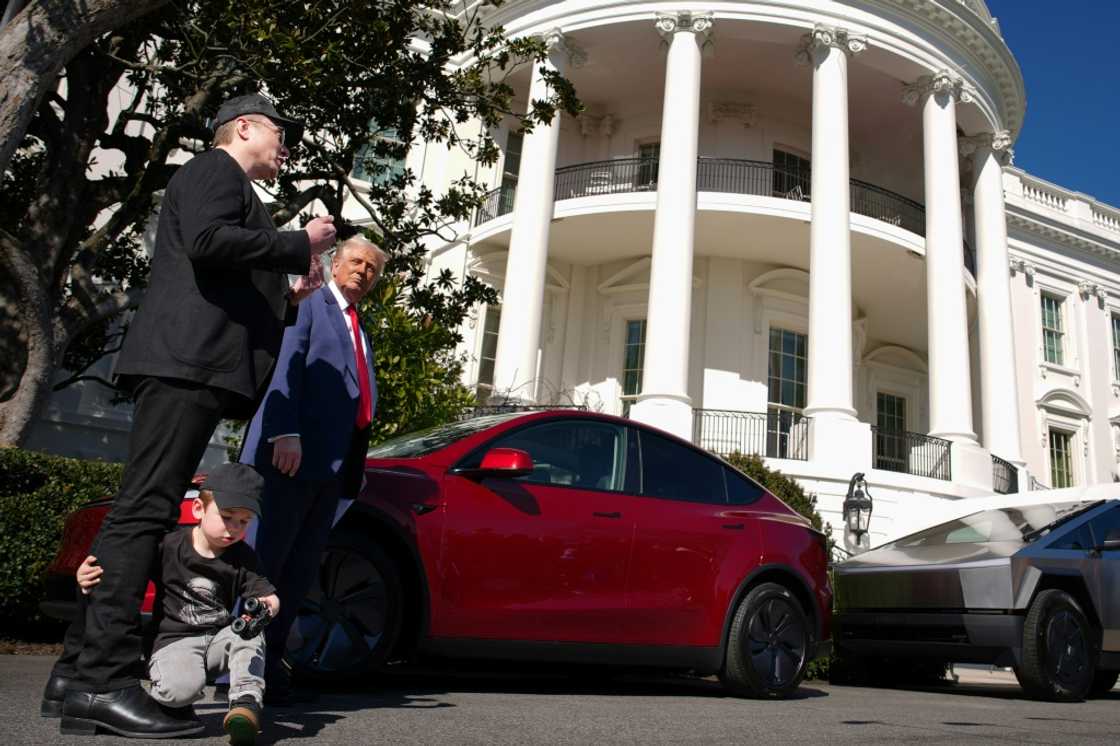 WASHINGTON, DC - MARCH 11: X Æ A-Xii, the son of White House Senior Advisor, Tesla and SpaceX CEO Elon Musk, plays with a toy car as Musk and U.S. President Donald Trump speak alongside a Tesla Model Y and a Cyber Truck on the South Lawn of the White House on March 11, 2025 WASHINGTON, DC - MARCH 11: X Æ A-Xii, the son of White House Senior Advisor, Tesla and SpaceX CEO Elon Musk, plays with a toy car as Musk and U.S. President Donald Trump speak alongside a Tesla Model Y and a Cyber Truck on the South Lawn of the White House on March 11, 2025
