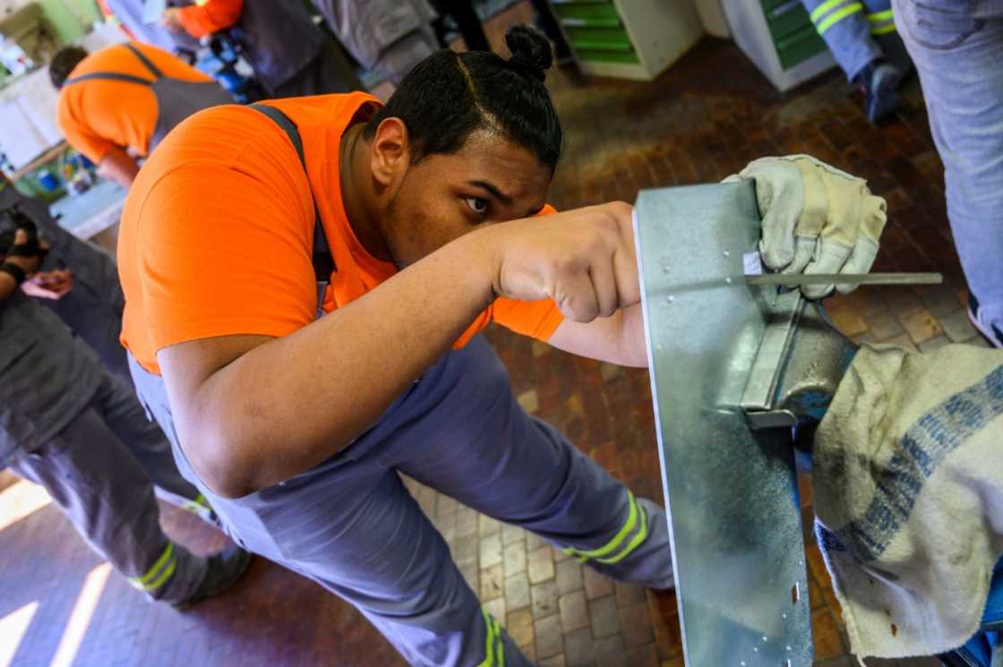 Each year around 50 new trainees join a programme with ArcelorMittal in Eisenhuettenstadt, where the steel group employs 2,700 people Each year around 50 new trainees join a programme with ArcelorMittal in Eisenhuettenstadt, where the steel group employs 2,700 people