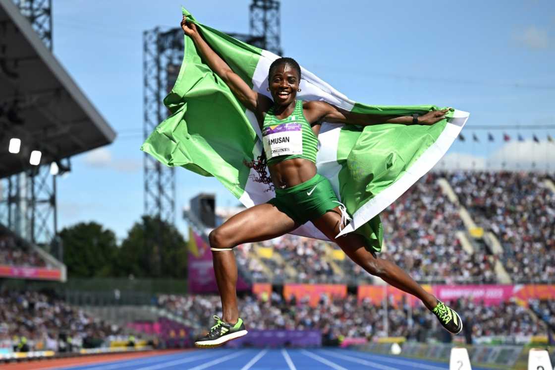 Nigeria's Tobi Amusan celebrates her 100m hurdles gold medal at the Commonwealth Games Nigeria's Tobi Amusan celebrates her 100m hurdles gold medal at the Commonwealth Games