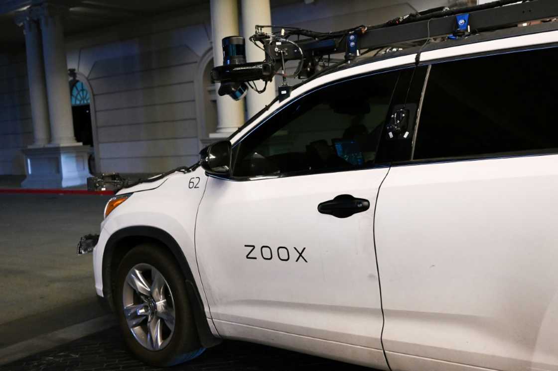 A Toyota sport-utility vehicle modified by Zoox, a subsidiary of Amazon.com, which combines radars, lidar, and cameras to test its software, drives on a road ahead