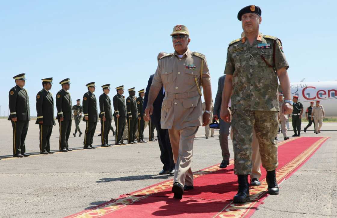 General Abdel Razaq al-Nadhouri (C), second in command of the forces of eastern-based strongman Khalifa Haftar, made an unprecedented visit to Tripoli on Monday and Tuesday to meet with his counterpart in the west, General Mohammad al-Haddad General Abdel Razaq al-Nadhouri (C), second in command of the forces of eastern-based strongman Khalifa Haftar, made an unprecedented visit to Tripoli on Monday and Tuesday to meet with his counterpart in the west, General Mohammad al-Haddad