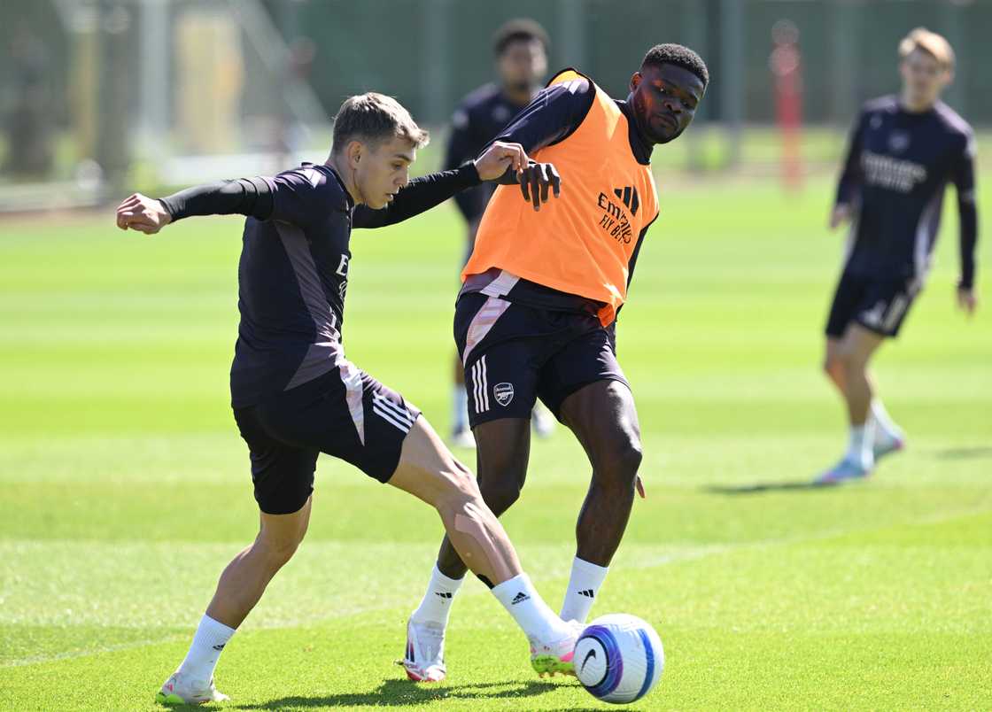 Leandro Trossard and Thomas Partey of Arsenal during a training session at Sobha Realty Training Centre on April 11, 2025 in London Colney, England Leandro Trossard and Thomas Partey of Arsenal during a training session at Sobha Realty Training Centre on April 11, 2025 in London Colney, England