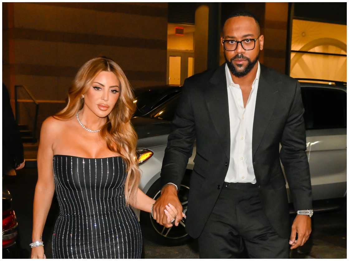 Larsa Pippen and Marcus Jordan holding hands in New York City. Larsa Pippen and Marcus Jordan holding hands in New York City.
