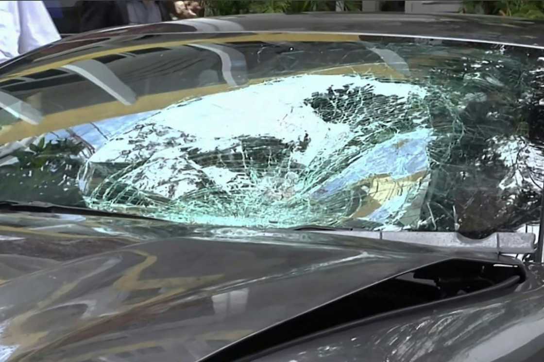 A frame grab from video footage taken in September 2012 shows the Ferrari belonging to Red Bull heir Vorayuth 'Boss' Yoovidhya in Bangkok after a hit-and-run that resulted in the death of a police officer A frame grab from video footage taken in September 2012 shows the Ferrari belonging to Red Bull heir Vorayuth 'Boss' Yoovidhya in Bangkok after a hit-and-run that resulted in the death of a police officer