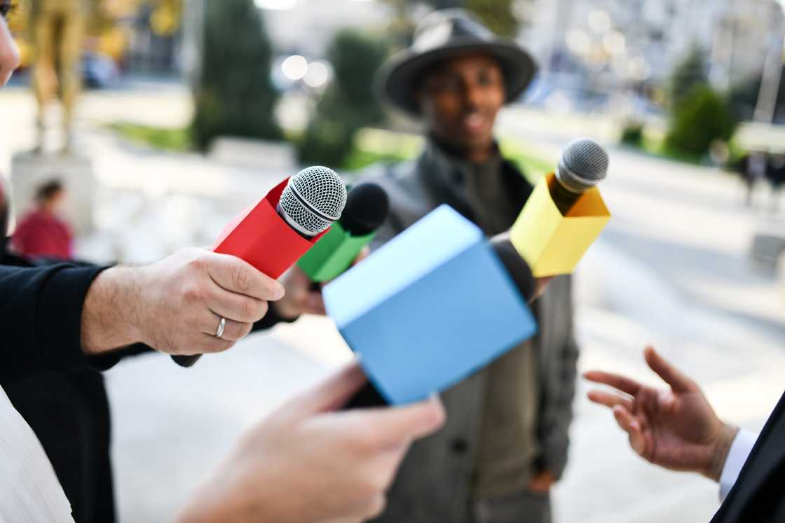 Media team with microphones Media team with microphones