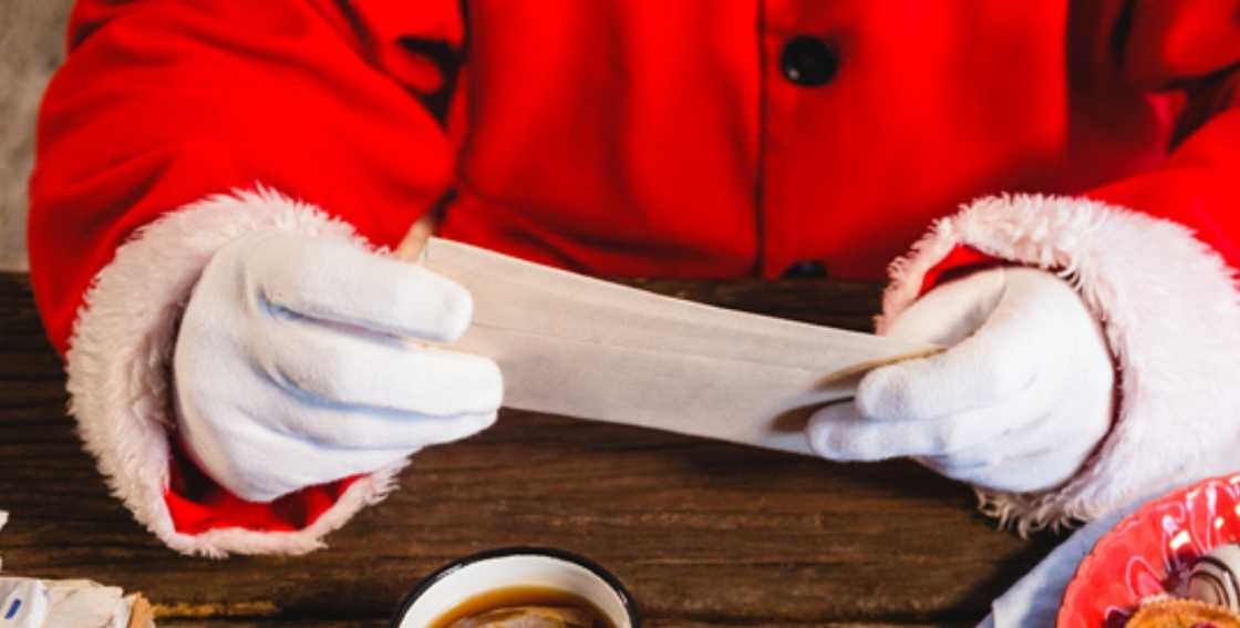 Santa Claus holding letter Santa Claus holding letter