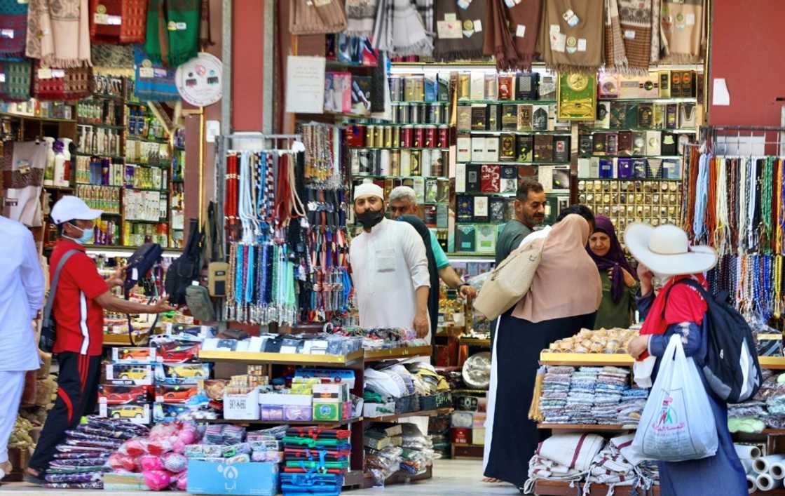 Muslim pilgrims shop in the holy city of Mecca -- part of a resurgence in business that has cheered local merchants