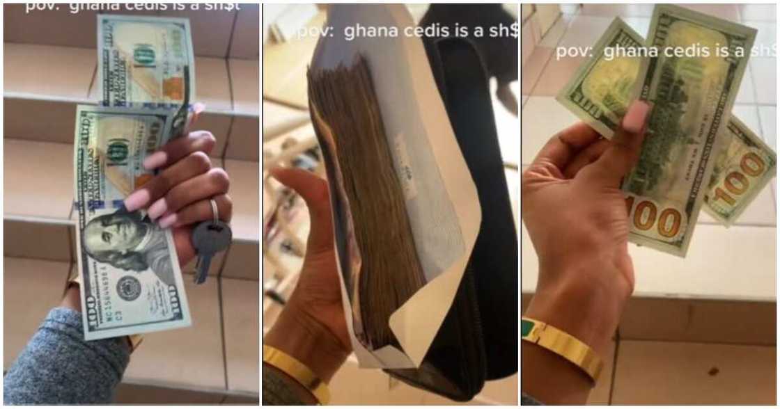 Woman shows the amount of cedis she got when she changed $200