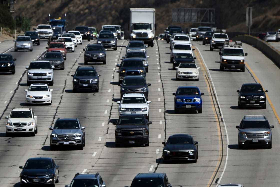 Cars, trucks, SUVs, and other vehicles drive in traffic on the 405 freeway through the Sepulveda Pass in Santa Monica, California, on August 25, 2022