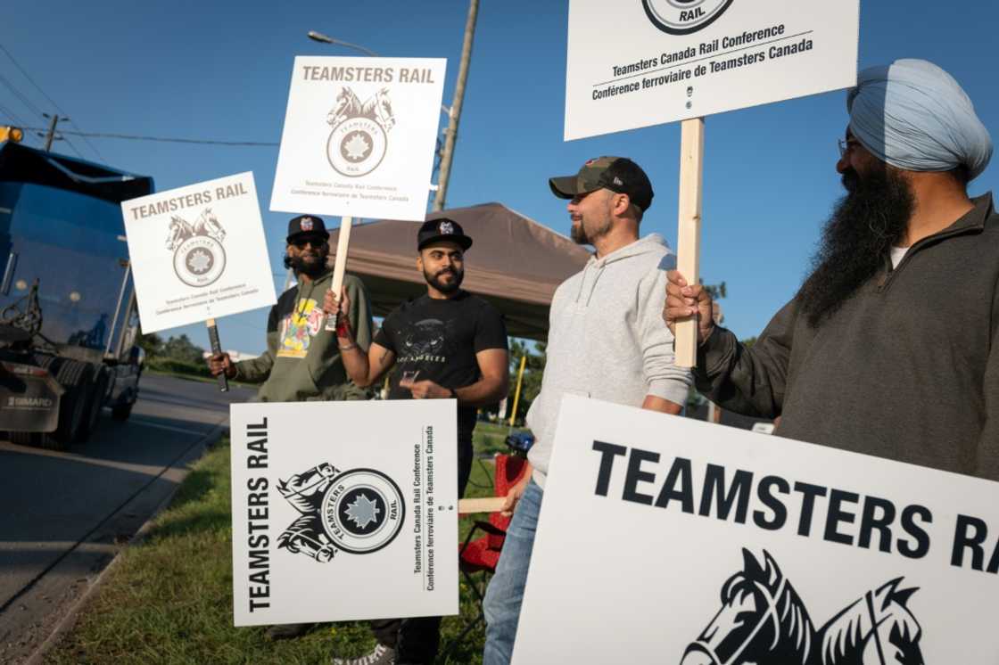 Locked out railway workers picket outside the CN Rail Brampton yard in Ontario province Locked out railway workers picket outside the CN Rail Brampton yard in Ontario province