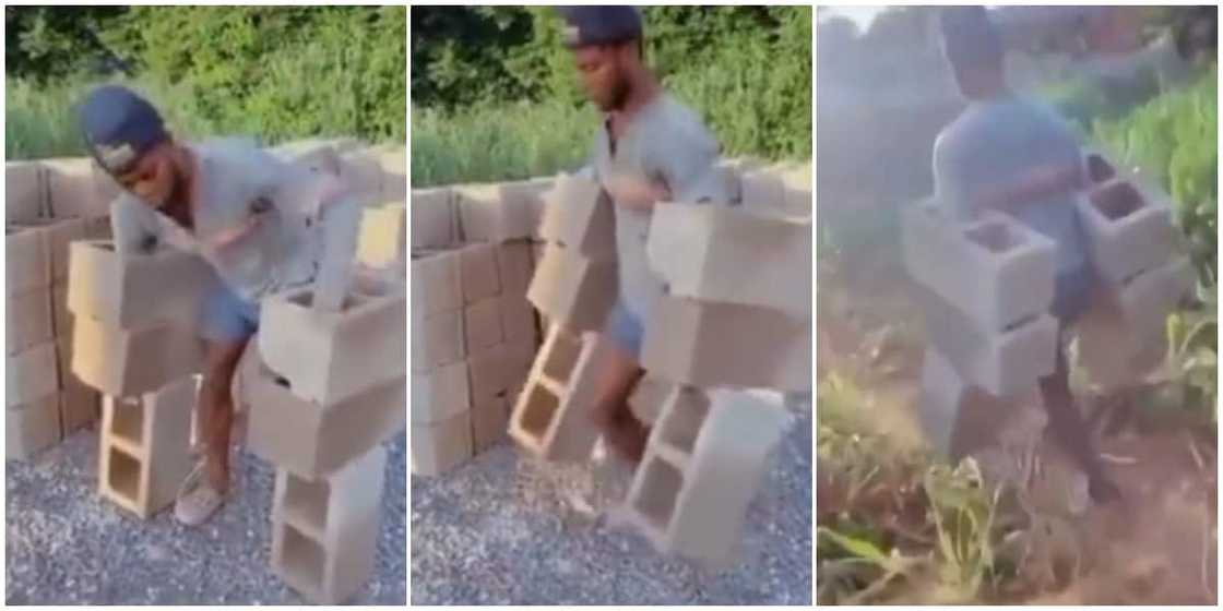 Reactions as man carries 6 bricks at once in incredible video Reactions as man carries 6 bricks at once in incredible video