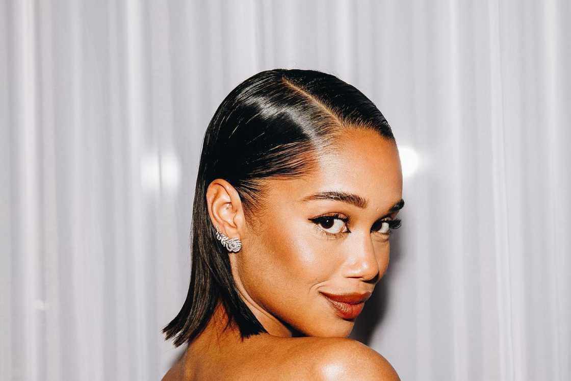 Side-parted slicked back hairstyle Side-parted slicked back hairstyle