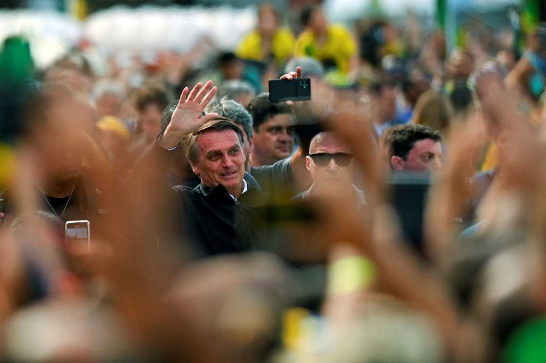 Brazil's President Jair Bolsonaro (C) still has "every chance" to win re-election in October 2022, despite trailing in pre-election polls, according to political analyst Leandro Gabiati Brazil's President Jair Bolsonaro (C) still has "every chance" to win re-election in October 2022, despite trailing in pre-election polls, according to political analyst Leandro Gabiati